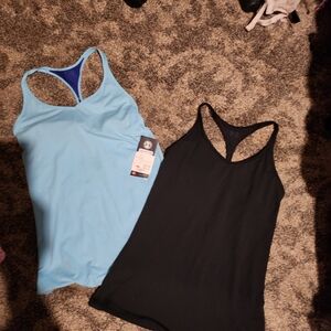 Lot of 2 Under Armour small/p heat gear, fitted tank tops